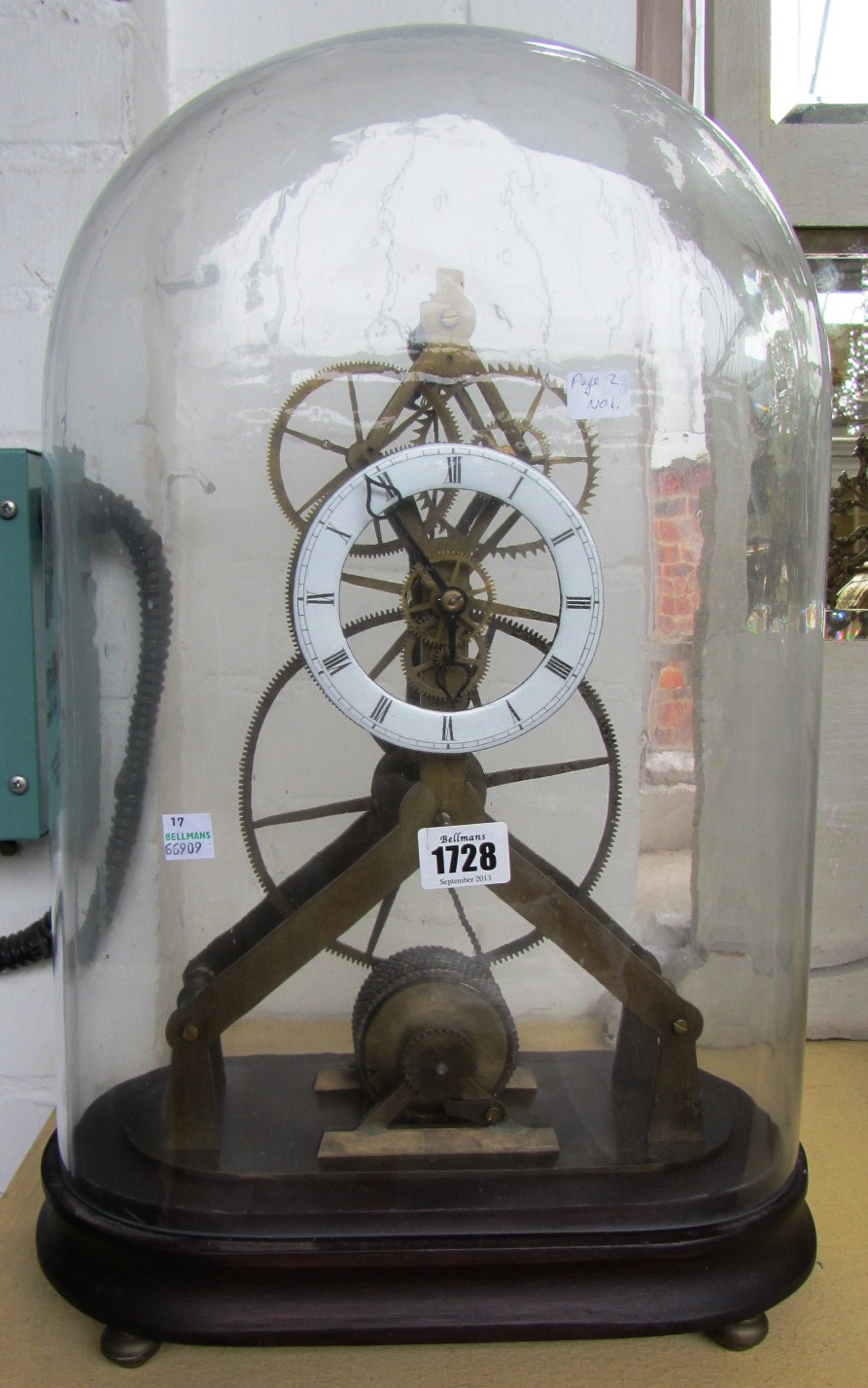 Appraisal: A late th century brass skeleton clock of typical form