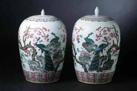 Appraisal: PAIR CHINESE FAMILLE ROSE PORCELAIN JARS AND COVERS th century