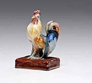 Appraisal: Rookwood Polychrome Rooster Ohio a Rookwood polychrome rooster on a