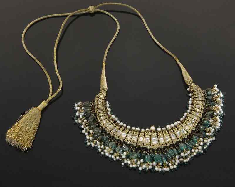 Appraisal: A Mughal-style gem-set enameled K gold necklaceset with diamonds emeralds