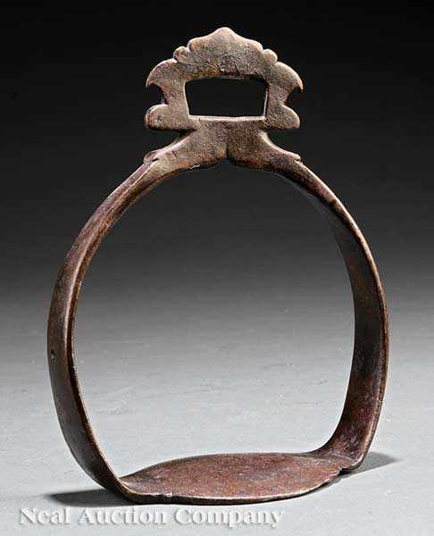 Appraisal: An Antique Asian Forged Iron Stirrup probably Persian arched form