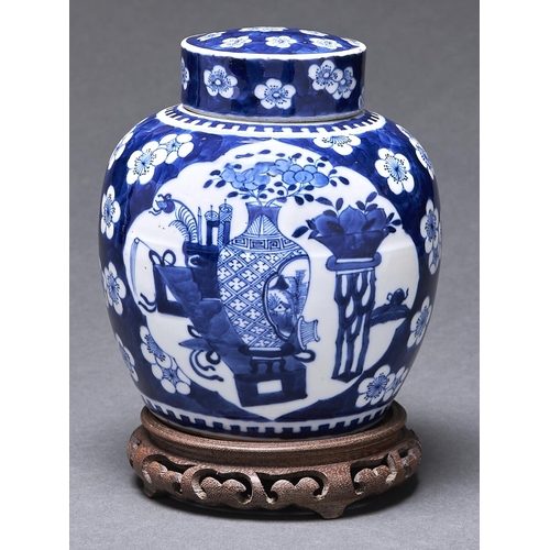 Appraisal: A Chinese prunus on cracked ice jar and cover late