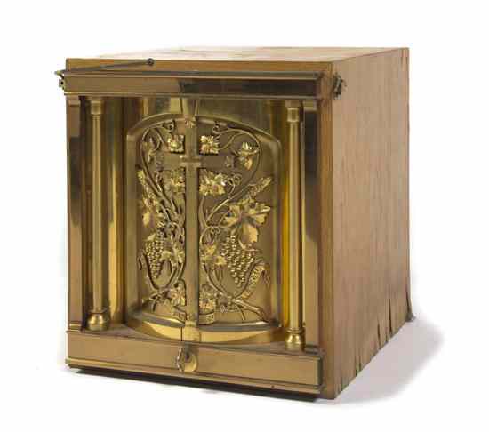 Appraisal: A Gilt Bronze Tabernacle having demilune doors with applied grapevine