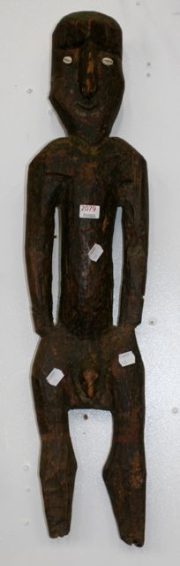 Appraisal: A carved wood figure of a man with shell eyes