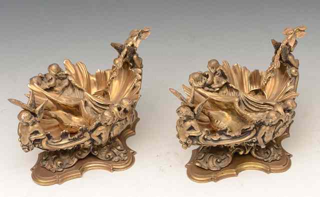 Appraisal: A PAIR OF VICTORIAN SILVER GILT DOUBLE SIDED TABLE SALTS