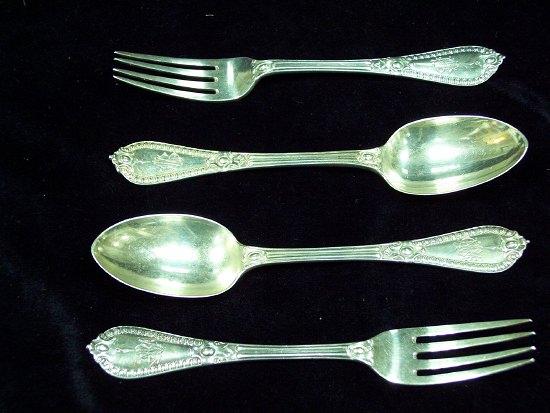 Appraisal: Two pairs of dessert spoons and forks with thread and