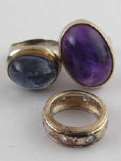 Appraisal: A mixed lot comprising three gem set rings in white