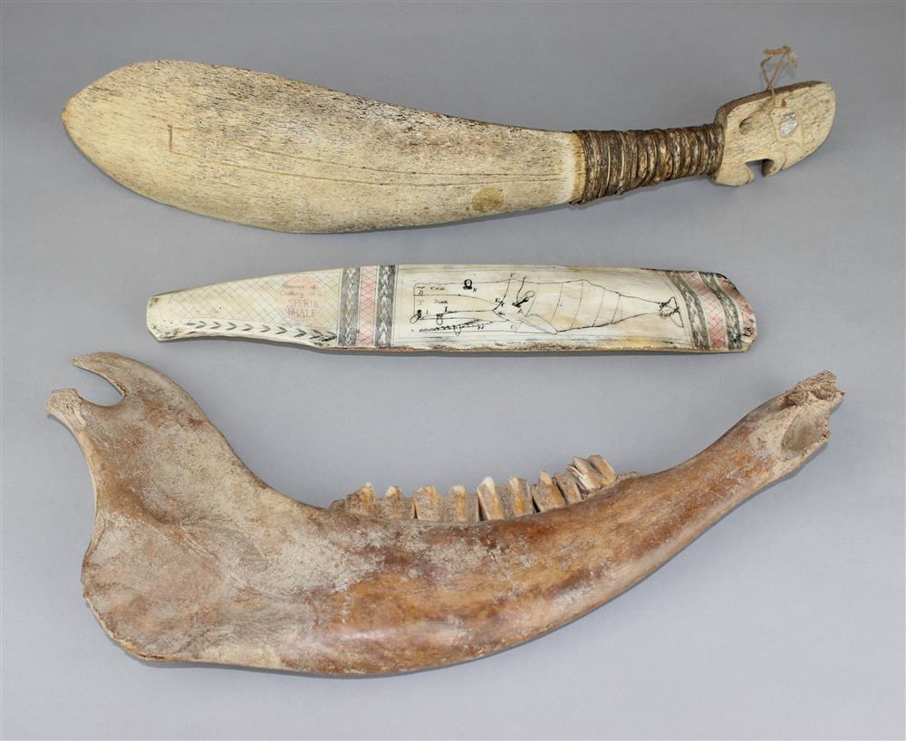 Appraisal: THREE BONE ARTIFACTS including a Northwest Coast style painted and