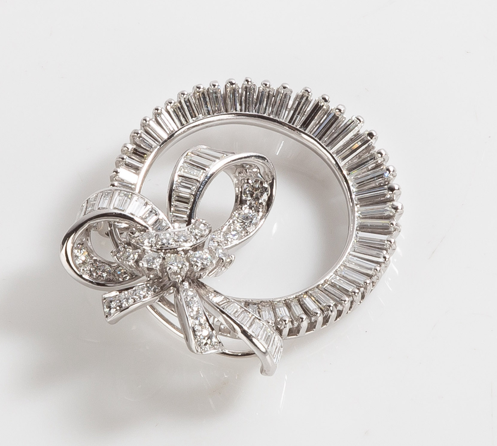 Appraisal: LADY'S ART DECO PLATINUM AND CT DIAMOND CIRCLE BOW MOTIF