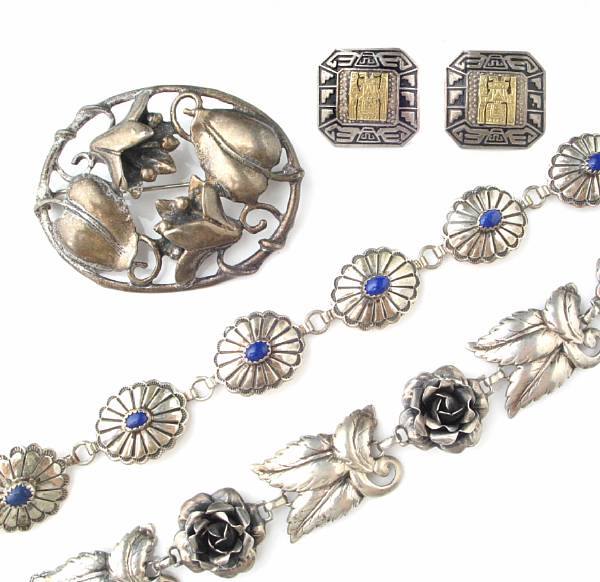 Appraisal: A collection of silver jewelry including two brooches two pair