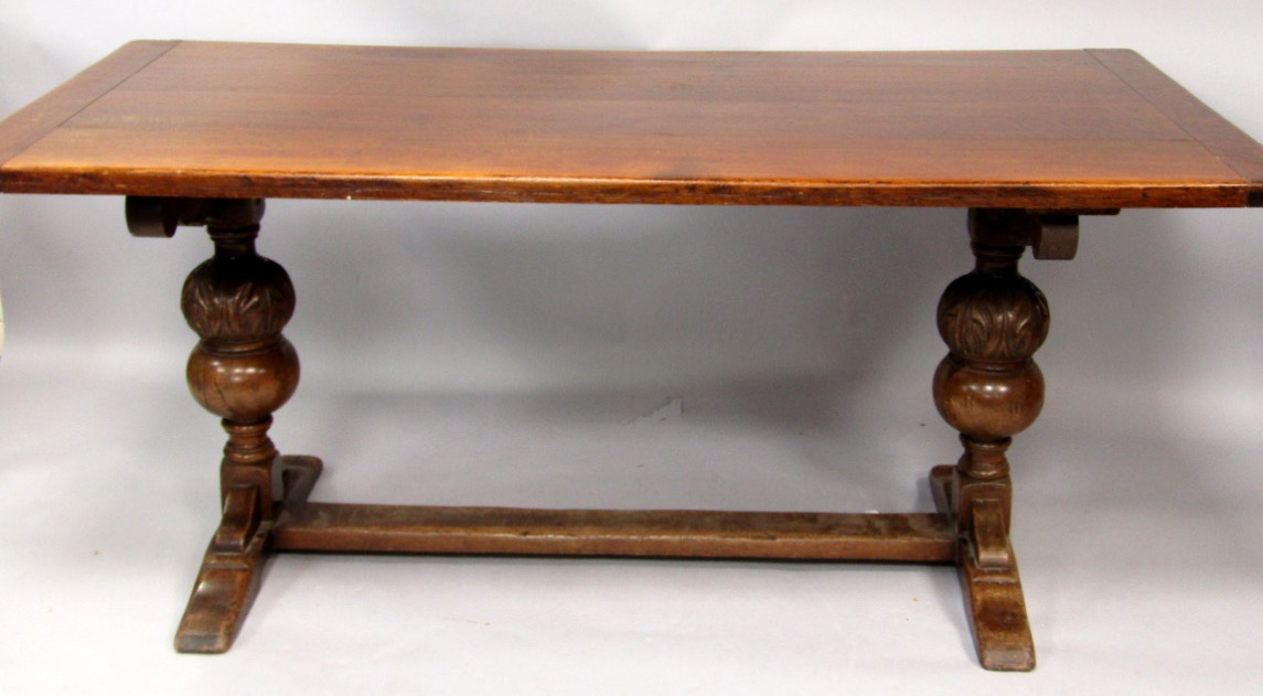 Appraisal: An oak refectory table the rectangular cleated four plank top