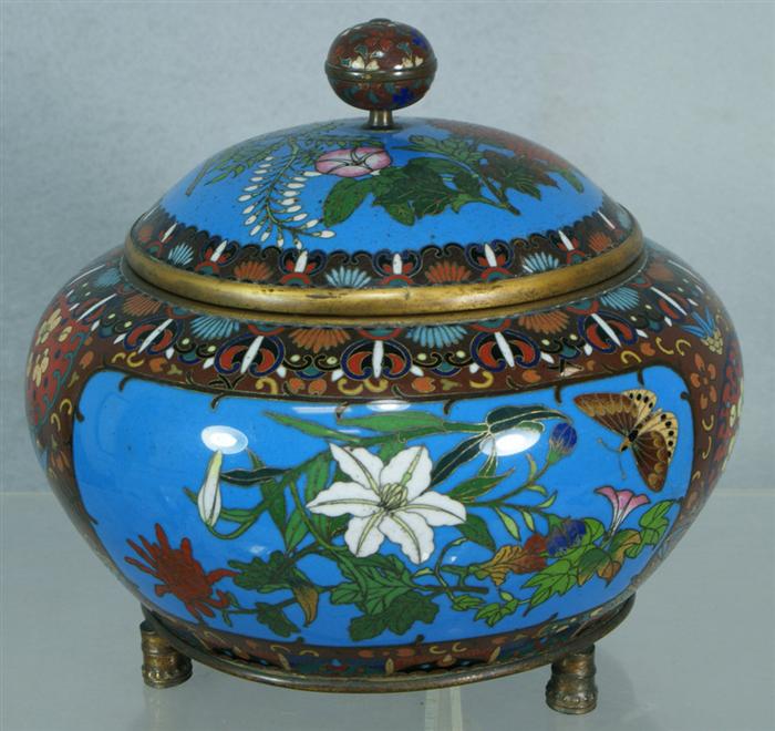 Appraisal: A cloisonne footed jar with cover depicting birds and flowers