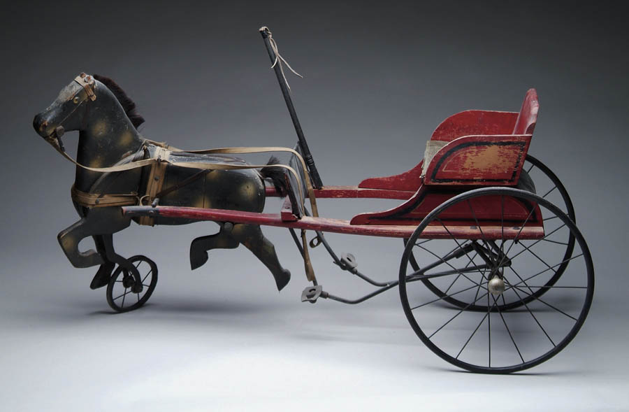 Appraisal: INTERESTING AND RARE ARTICULATED HORSE TRICYCLE The three-wheel tricycle has