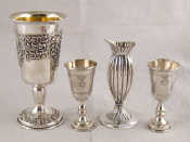 Appraisal: A matched pair of sterling silver kiddush cups London ht