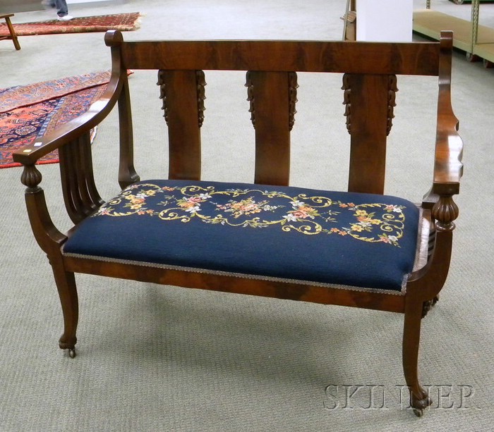 Appraisal: Empire-style Needlepoint Upholstered Carved Mahogany and Mahogany Veneer Settee lg