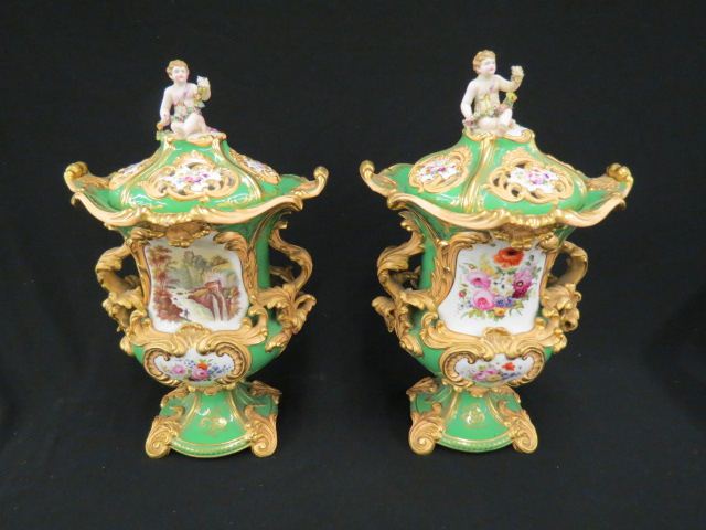 Appraisal: Pair of Impressive Porcelain Covered Urns handpainted landscapes florals green