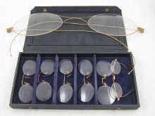 Appraisal: A display box containing five pairs of pince-nez glasses and