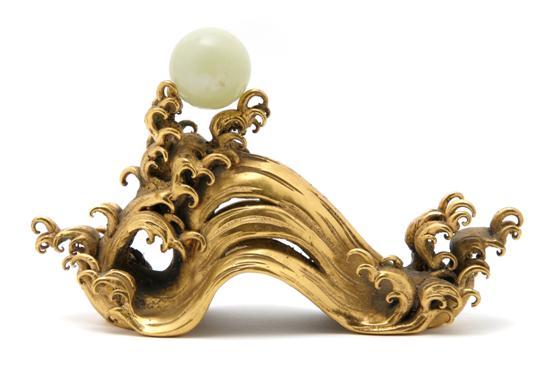 Appraisal: Japanese Gilt Bronze Model of a Wave having a glass