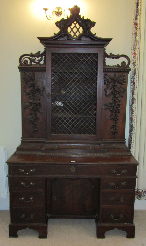 Appraisal: A thC mahogany cabinet in the manner of Thomas Chippendale