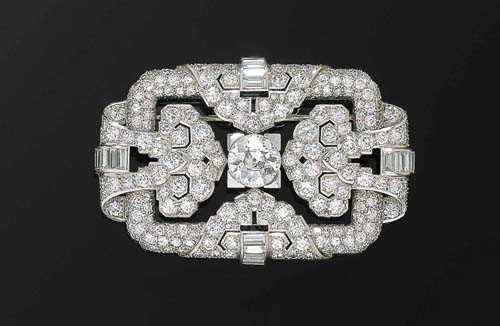 Appraisal: DIAMOND BROOCH ca Platinum Very attractive open-worked brooch in a