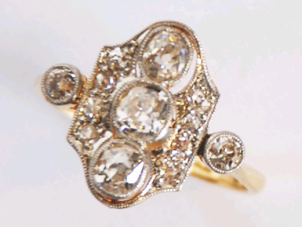 Appraisal: ct GOLD PLATINUM AND DIAMOND ART DECO RING with three