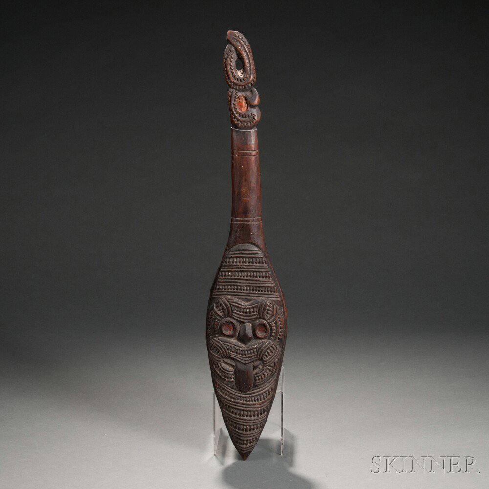 Appraisal: Maori Carved Wood Dance Paddle with stylized face on one