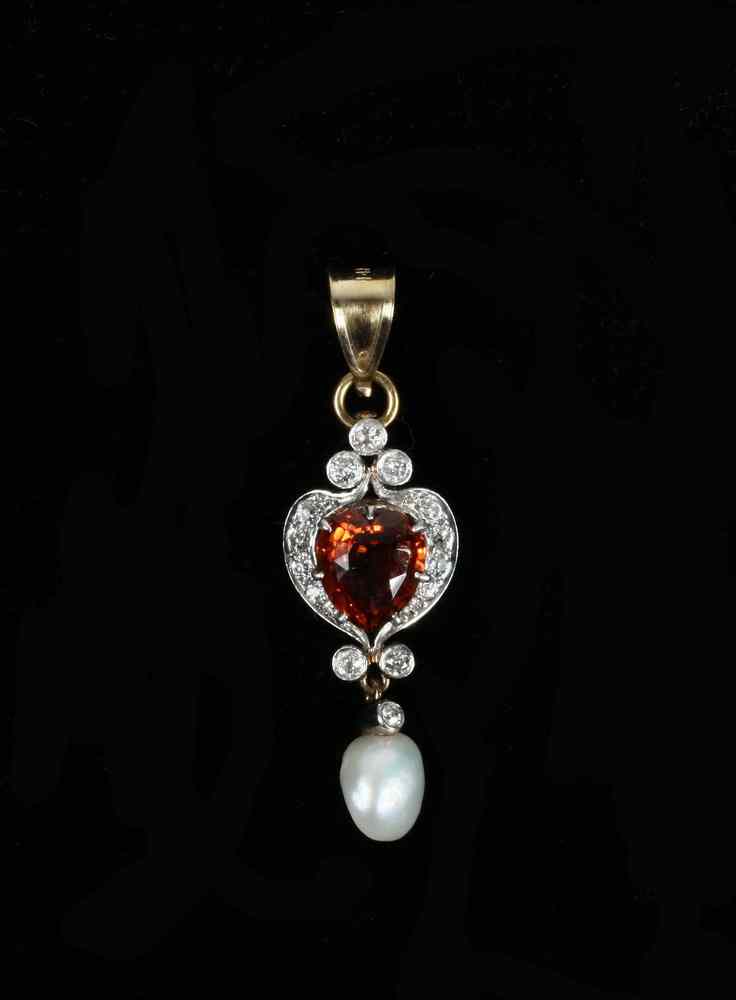 Appraisal: LAVALIER - Edwardian lavalier set with a heart shaped hessonite