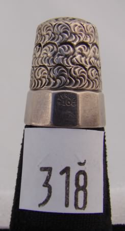 Appraisal: Simons sterling thimble with panel band