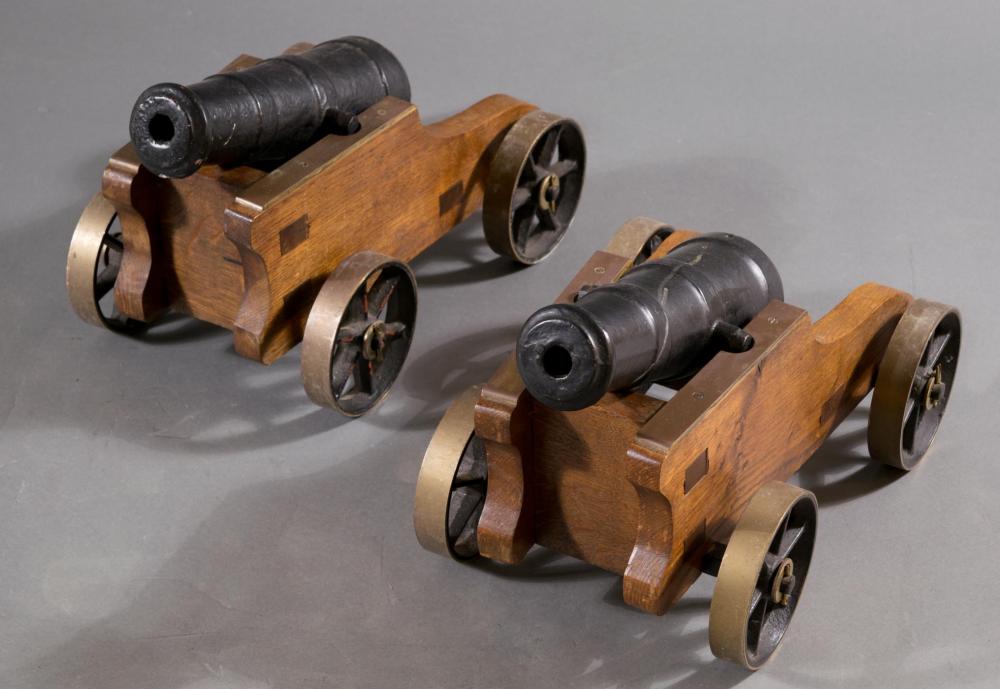 Appraisal: PAIR OF IRON SIGNAL SALUTE CANNONS modeled after the early