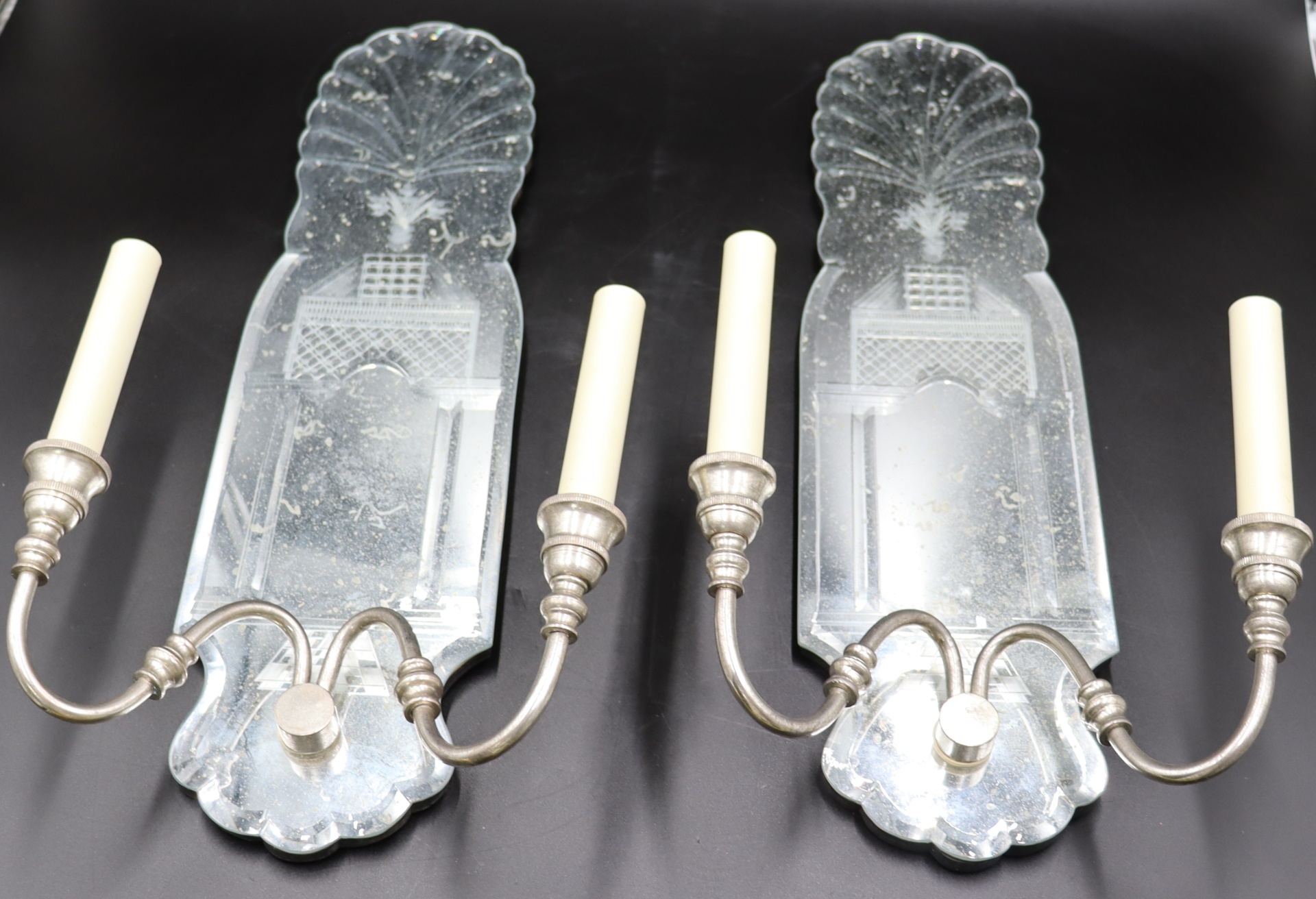 Appraisal: A VINTAGE PAIR OF ETCHED MIRRORED SCONCES Both have some