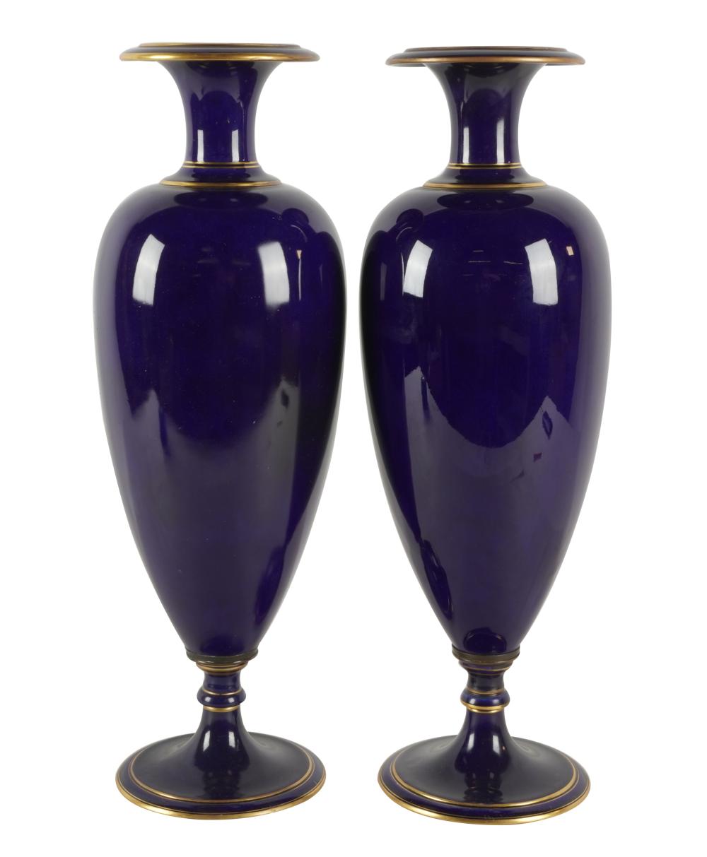 Appraisal: PAIR OF SEVRES COBALT PORCELAIN URNSone with printed mark to