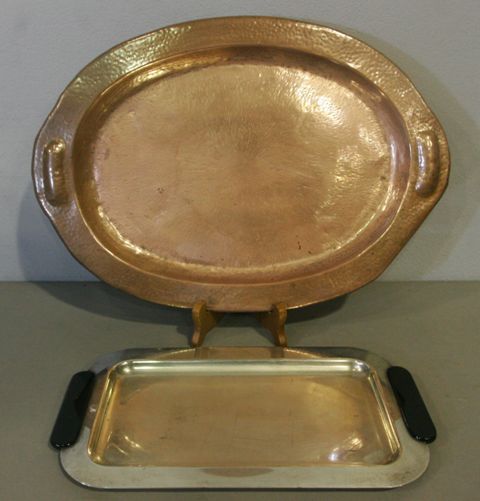 Appraisal: An arts and crafts copper tray with hammered decoration throughout