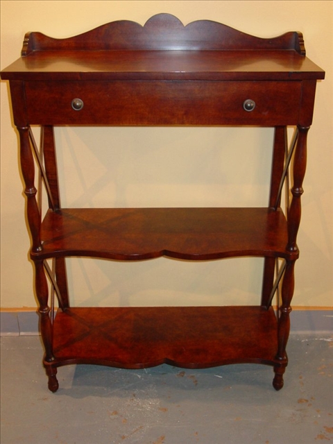 Appraisal: REGENCY STYLE WALNUT ETAGERE th c with a rectangular top