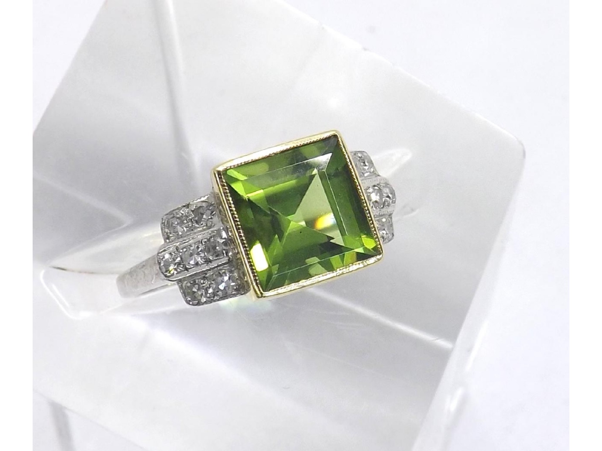 Appraisal: ct white gold peridot and diamond style ring in the