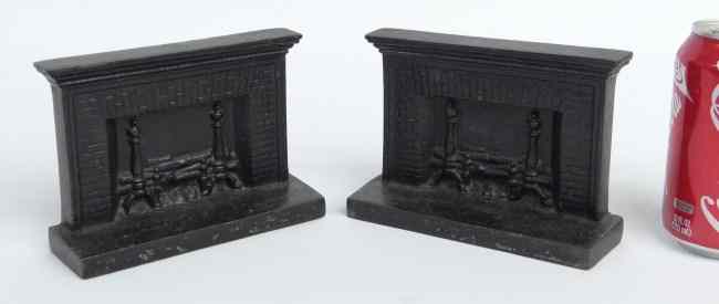 Appraisal: Pair vintage cast iron fireplace bookends