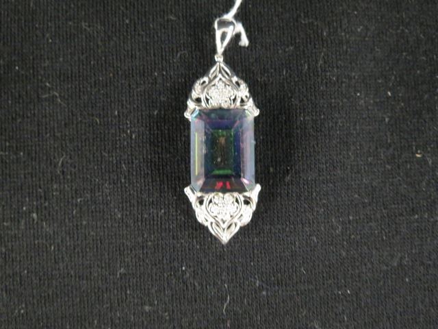 Appraisal: Mystic Topaz Diamond Pendant color changing carat emerald cut gem