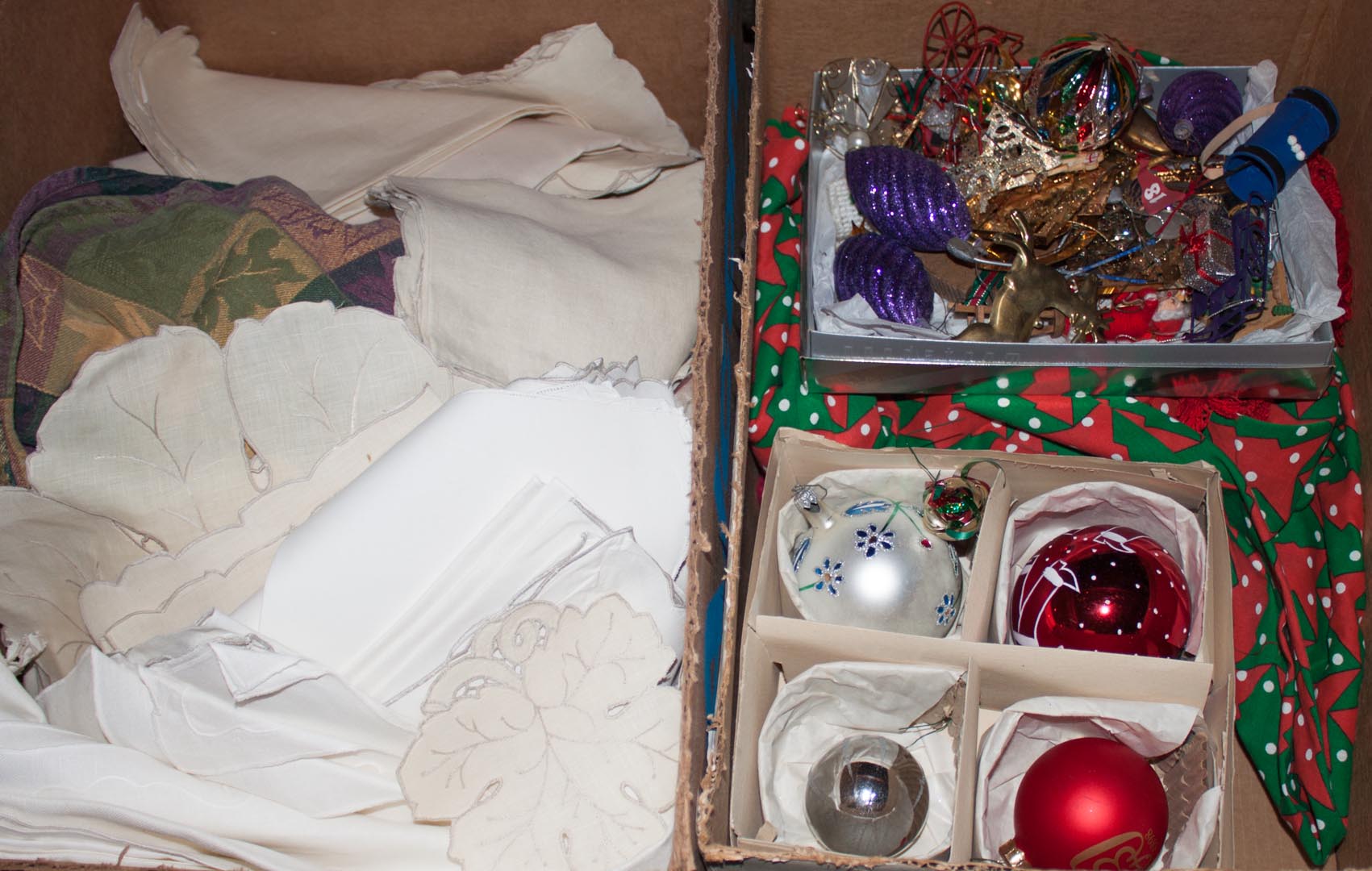 Appraisal: Boxes of Christmas ornaments and linens