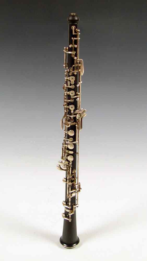 Appraisal: SELMER F WOOD OBOE WITH CASE Grenadilla wood body with