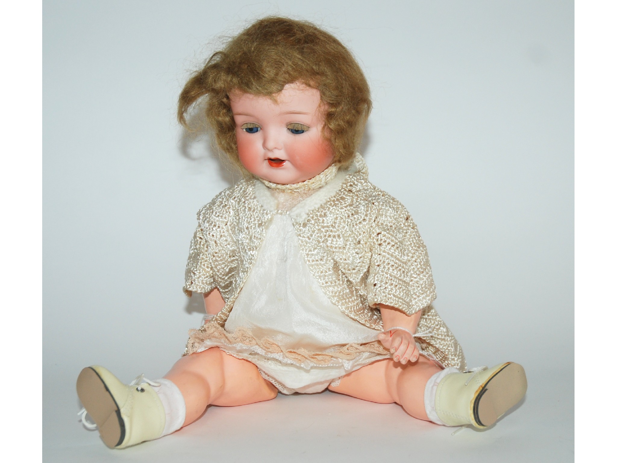 Appraisal: An Armand Marseille bisque-headed dollwith open and close blue eyes