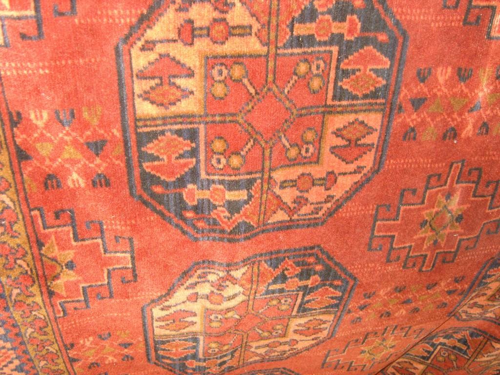 Appraisal: A machine woven rug in the Afghan style with red