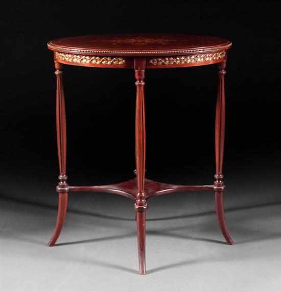 Appraisal: Victorian style brass-mounted marquetry inlaid mahogany side table th century