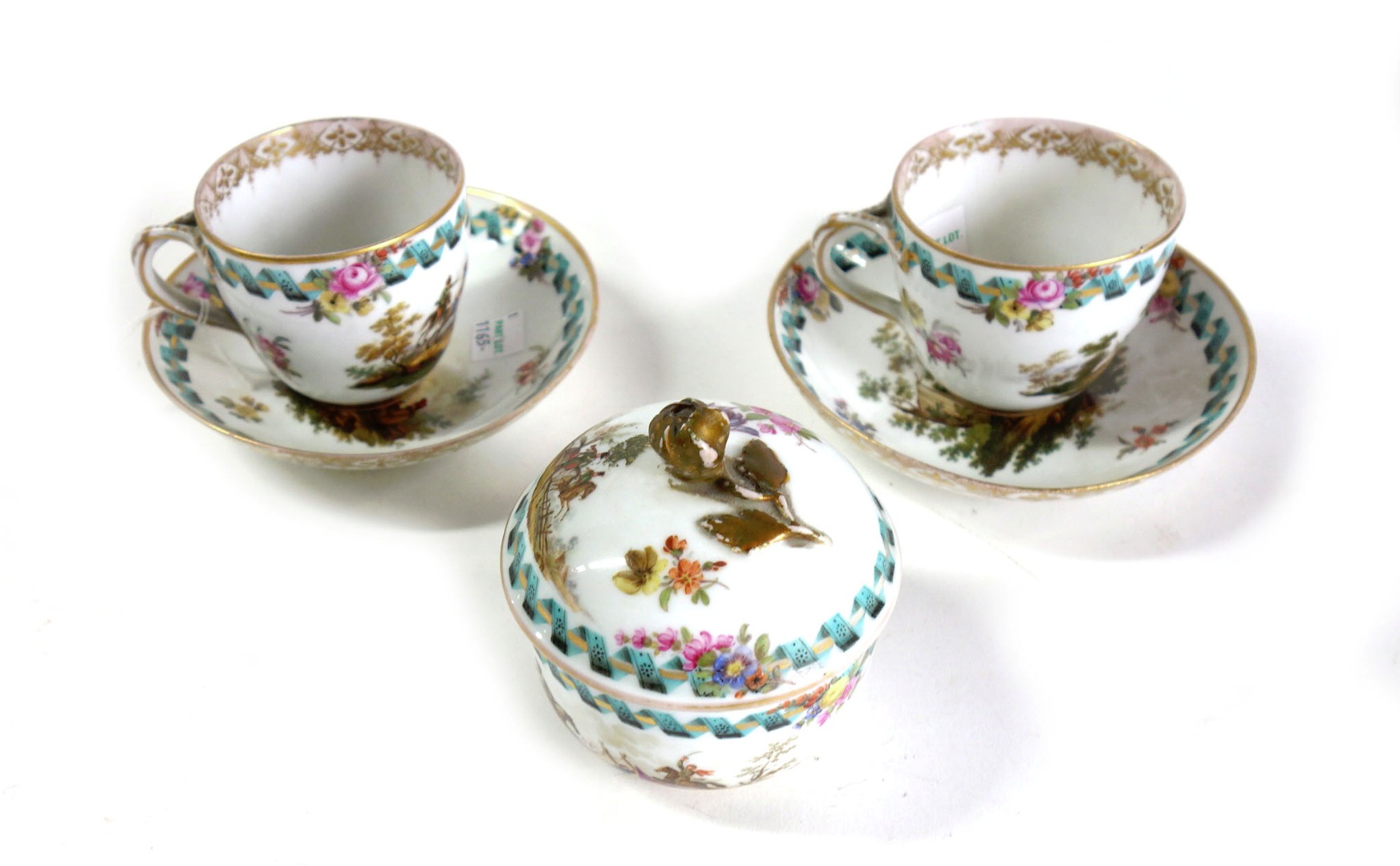 Appraisal: A pair of Meissen cups and saucers and a sugar