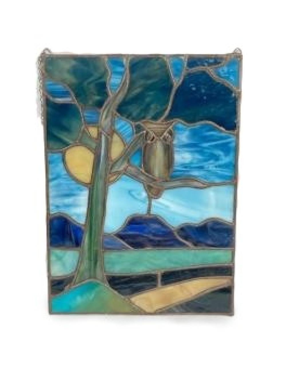 Appraisal: VINTAGE STAINED GLASS SCENIC MOONLIGHT WINDOW PANEL DEPICTING AN OWL