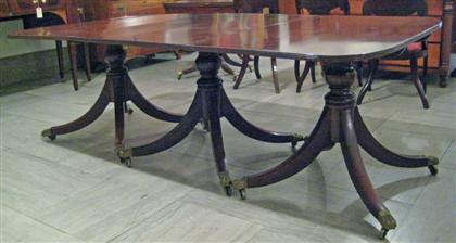 Appraisal: Federal style mahogany three-part dining table Having an oval top