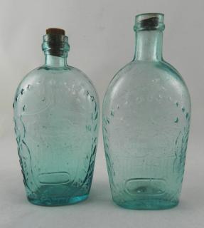 Appraisal: Flasks Flasks- Clasped hands pint aqua- Clasped hands in shield