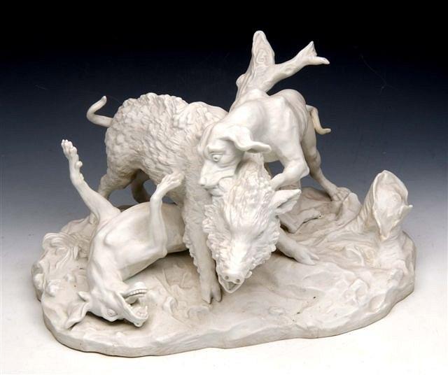 Appraisal: A SEVRES BISCUIT PORCELAIN FIGURAL GROUP of hounds attacking a