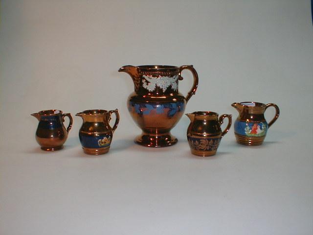 Appraisal: A thC copper lustre milk jug sprigs with fine and