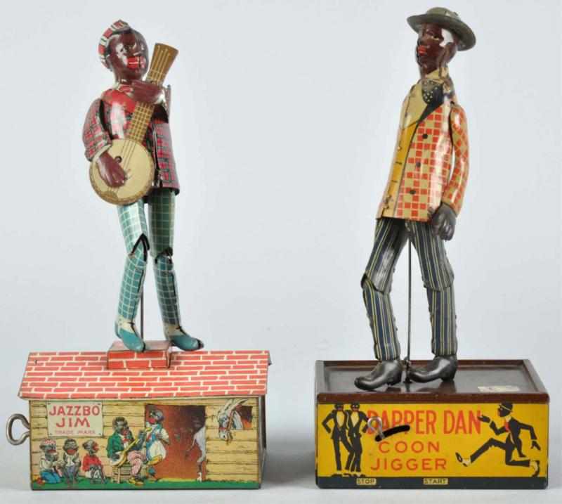 Appraisal: Lot of Tin Litho African American Wind-Up Toys Description American