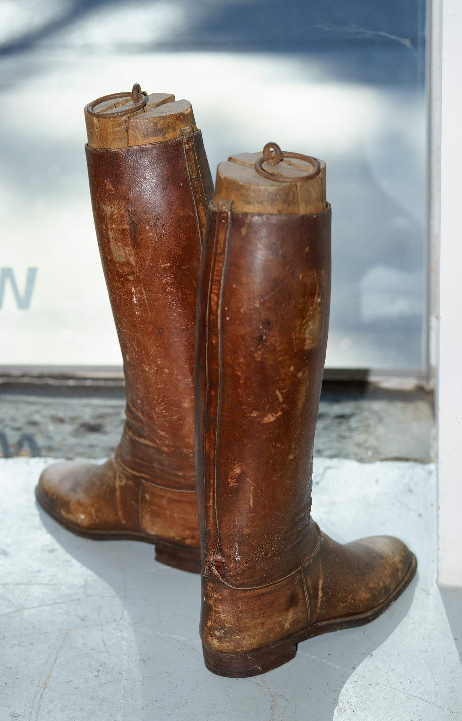 Appraisal: AN EARLY th CENTURY PAIR OF LEATHER RIDING BOOTS WITH