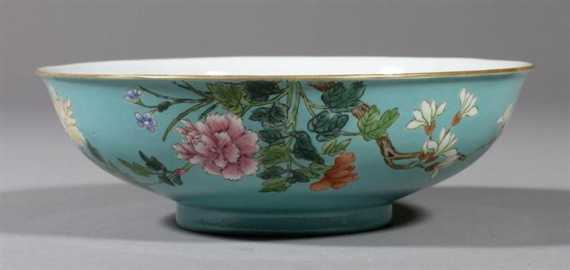 Appraisal: SHALLOW TURQUOISE GLAZED BOWL WITH POLYCHROME PEONIES AND MAGNOLIA BRANCHES